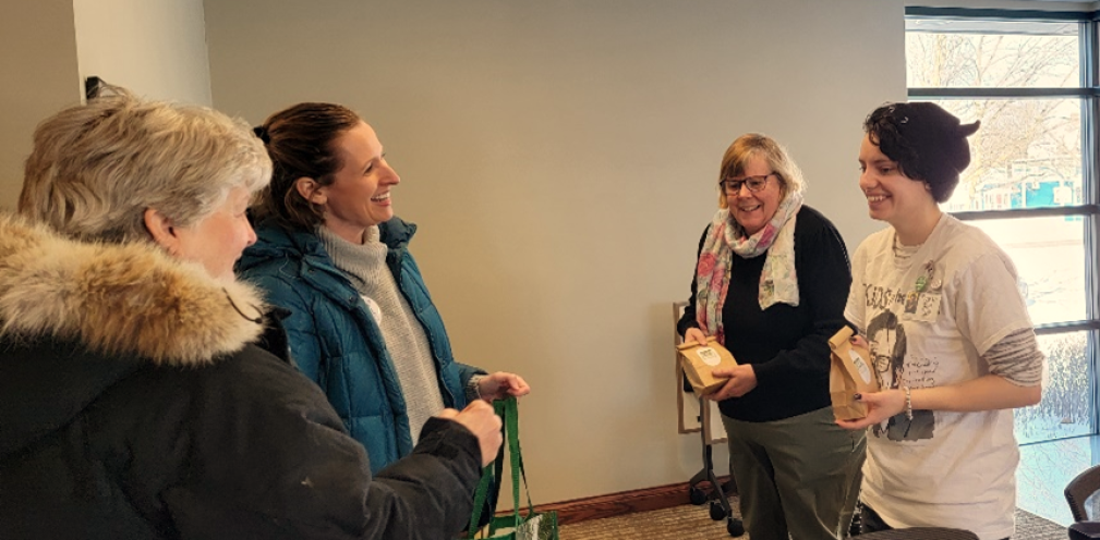 woman presenting in front of group